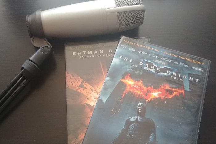 Batman Begins and The Dark Knight DVD cased and a Microphone