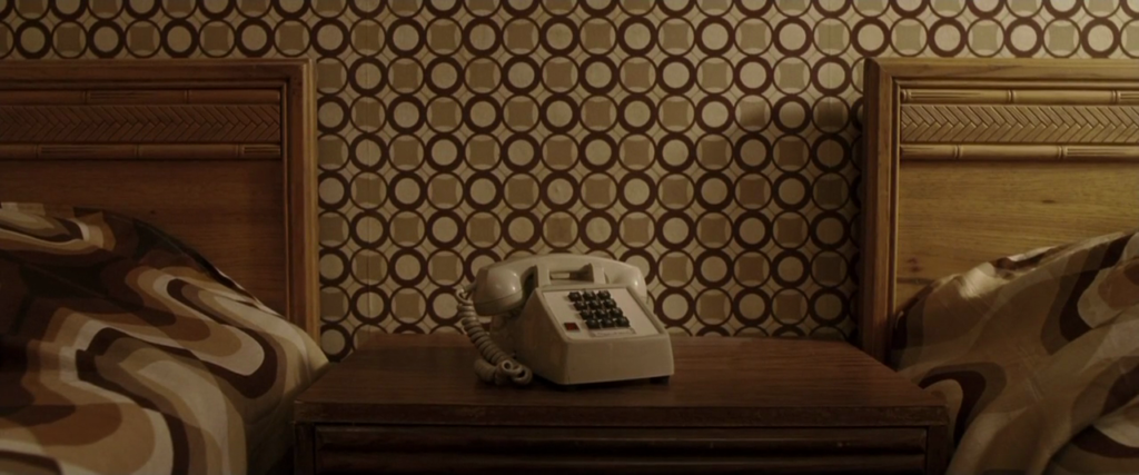 From movie Lucky Number Slevin. Telephone on table in hotel room