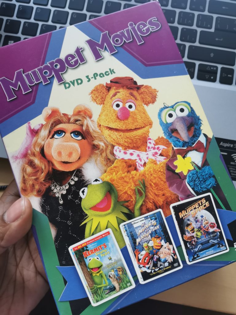 Image of Muppet Movies boxset with Mrs Piggy, Kermit, Fozzie, and Gonzo on the cover.